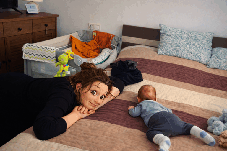 andie with newborn mike on the bed
