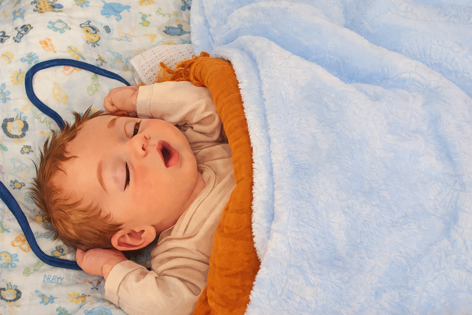 newborn mike sleeping with eyes wide open